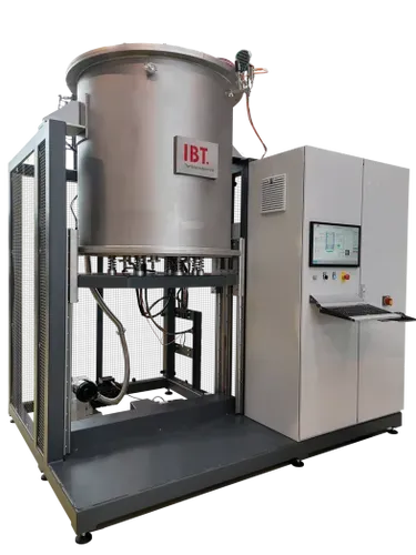 Das Bild zeigt einen Vakuumofen mit Hubboden aus Edelstahl der Firma IBT Thermprozesse aus Freiberg, der zum homogenen Sintern von Metallen unter Schutzgas bis 1.200 °C geeignet ist.